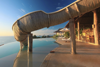 Illustration for article titled 12 Cool Pools You Wish You Were Swimming In Now